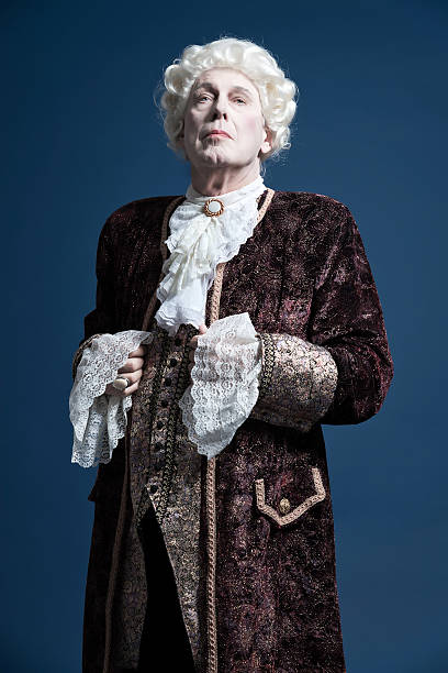 istock Retro baroque man with white wig standing and looking arrogant. 498765307