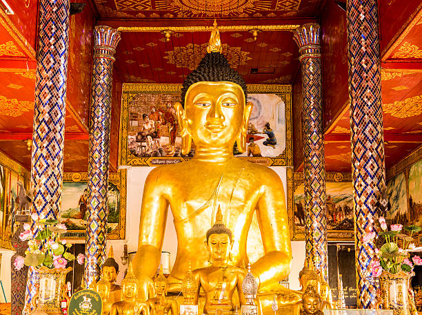 istock buddha statue  in wat pratajhariphunchai lumphun Thailand 498768266