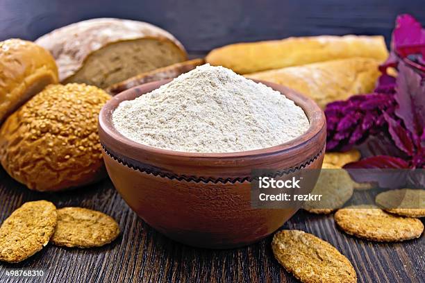 Flour Amaranth In Clay Bowl With Bread On Board Stock Photo - Download Image Now - Amaranthus, Flour, 2015