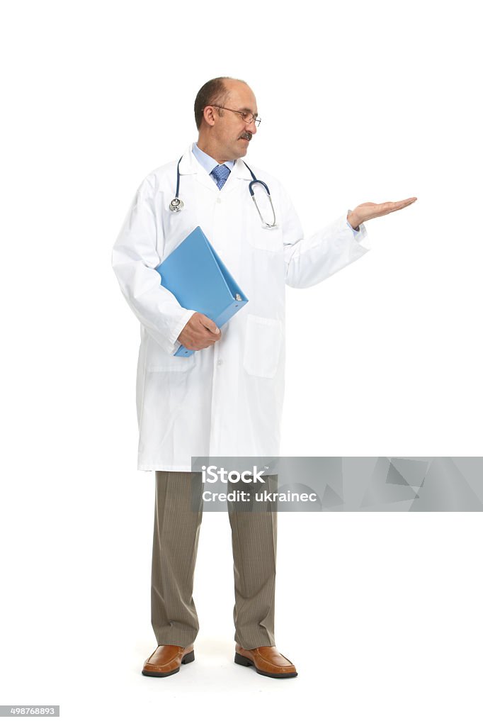 Medical doctor The doctor with the book and stethoscope on a white background Adult Stock Photo