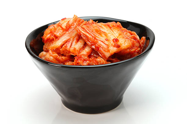 Kimchi Kimchi (Korean food) close up on white background Kimchi stock pictures, royalty-free photos & images