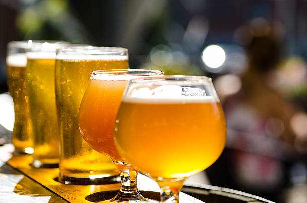 Many tasty beers image of many beer glasses filled with beer craft beer stock pictures, royalty-free photos & images