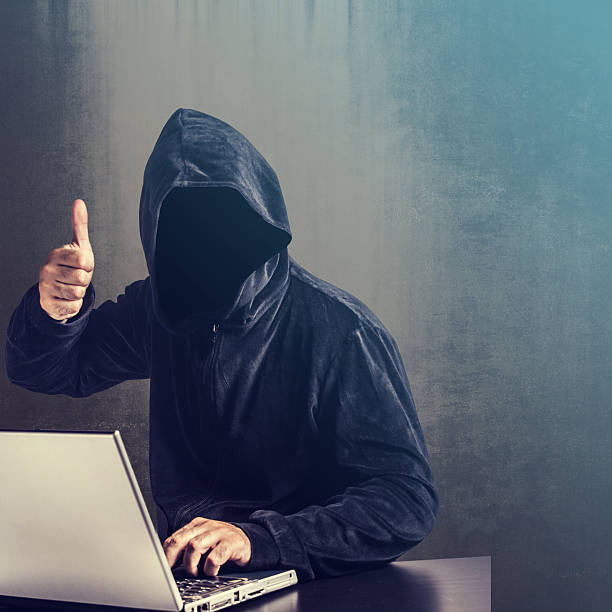 Hacker at work stock photo