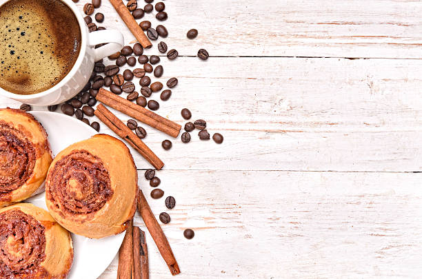 Cinnamon rolls with coffee. Background.