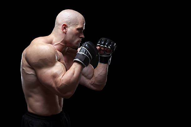 ultimate fighter - human muscle abdominal muscle men exercising - fotografias e filmes do acervo