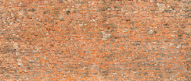 Huge authentic old brick wall background. Panoramic