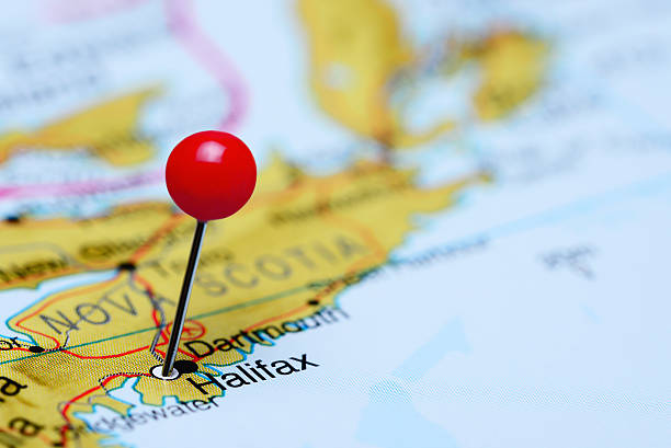 Halifax pinned on a map of Canada Photo of pinned Halifax on a map of Canada. May be used as illustration for traveling theme. maritime provinces stock pictures, royalty-free photos & images