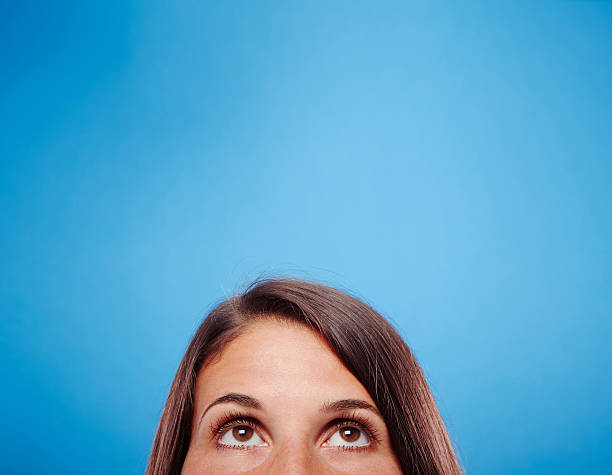 istock Young female against blue background 498785141
