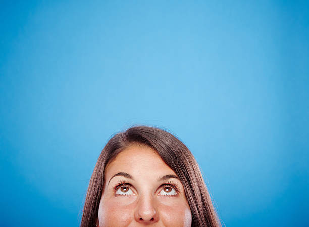 istock Young female against blue background 498788825