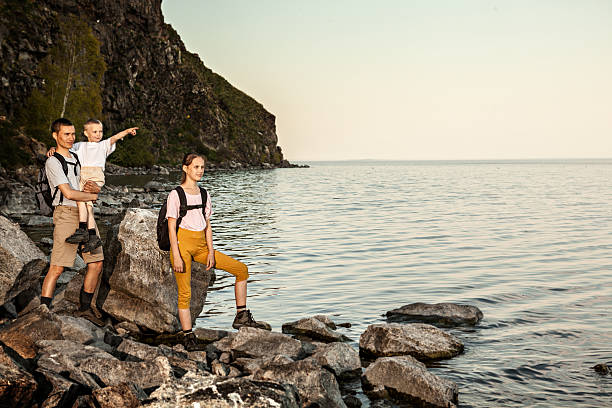 istock Family at lake 498790323