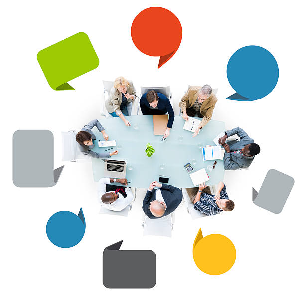 istock Small group business meeting with speech bubbles 498791431