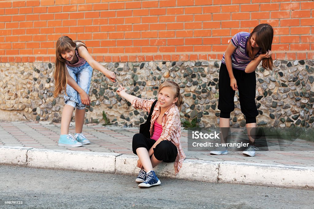 Teenage girls at the school building 14-15 Years Stock Photo