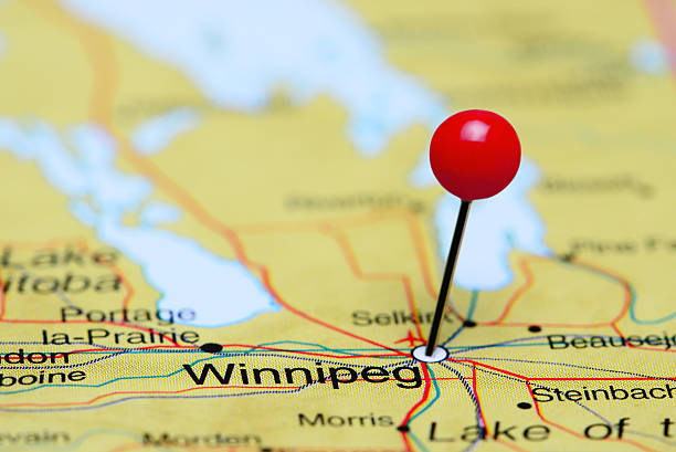 Winnipeg pinned on a map of Canada Photo of pinned Winnipeg on a map of Canada. May be used as illustration for traveling theme. winnipeg photos stock pictures, royalty-free photos & images