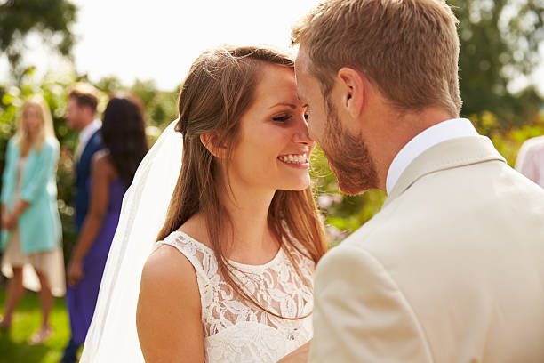 istock Romantic Young Couple Getting Married Outdoors 498799754