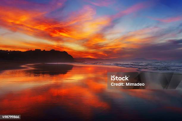 Red Sunset In Sopelana Beach Stock Photo - Download Image Now - 2015, Beach, Beauty