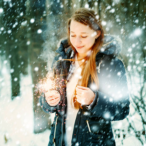 istock Beautiful Smiling Female Holding Sparklers 498801704