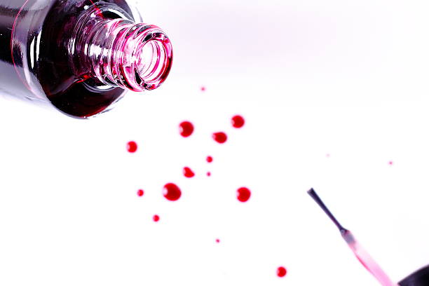 istock brush with nail polish / paint on light background 498805548