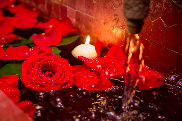 istock candles and rose petals at an evening corporate event 498807302