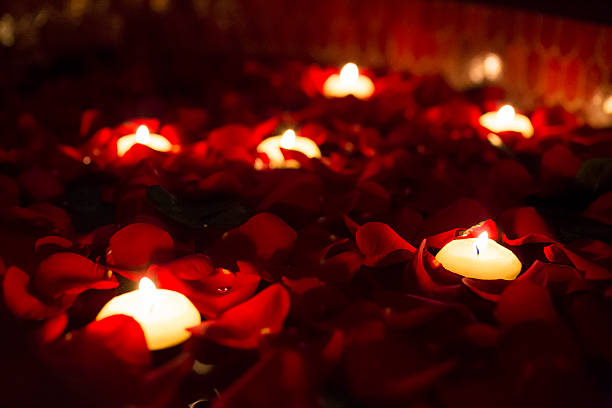 istock candles and rose petals at an evening corporate event 498807426