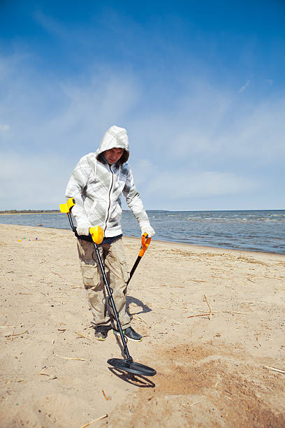 istock searching for a precious metal with a metal detector 498808997