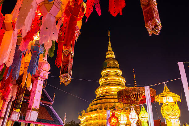 istock Gold pagoda and lantern hung up on the rail 498809250