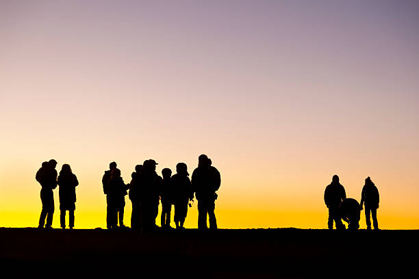 istock Group Of People At Sunset, Maui 498813357