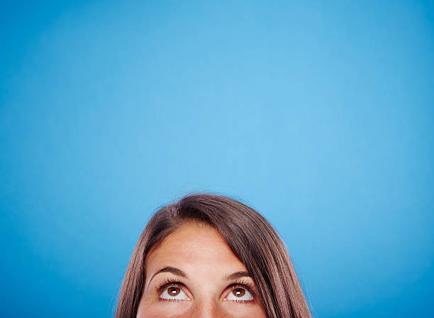 istock Young female against blue background 498826185