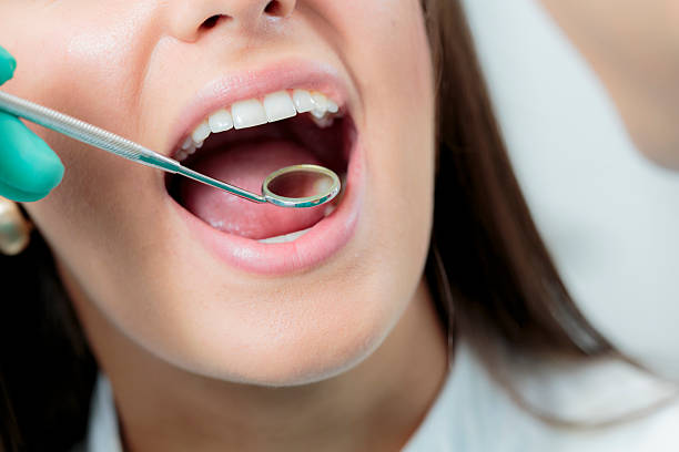 istock Young woman at the dentist 498827005