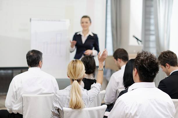 istock business woman giving presentation 498827245