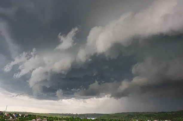 Beginning of the storm, cold weather front covers the village. Panorama stitched from 4 mages.