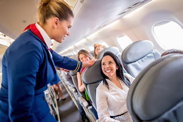 People traveling People traveling and enjoying the service onboard cabin crew stock pictures, royalty-free photos & images