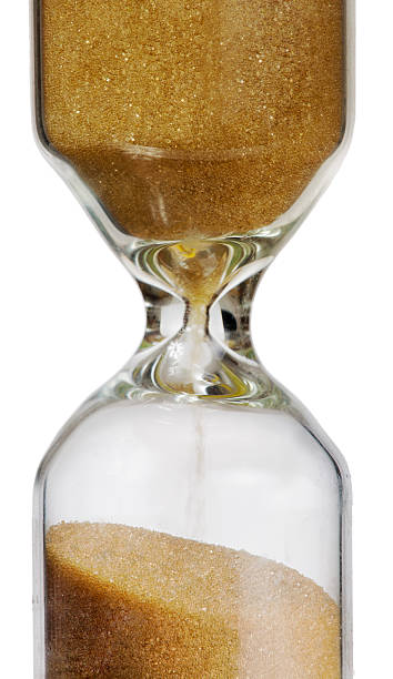 istock isolated golden sand glass 498832501