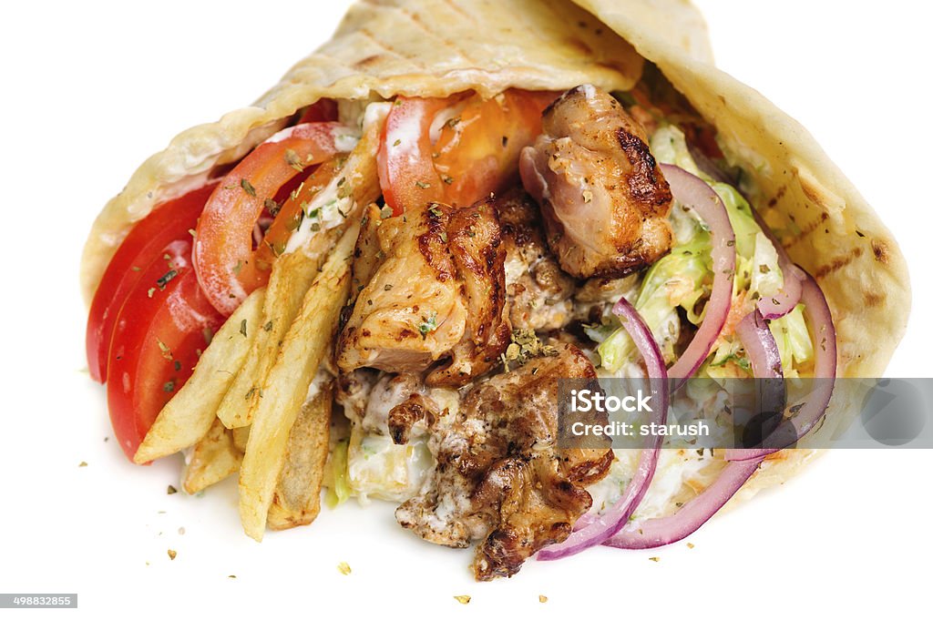 greek gyros greek gyros stuffed with meat, salad, onion, tomato and potato Wrap Sandwich Stock Photo
