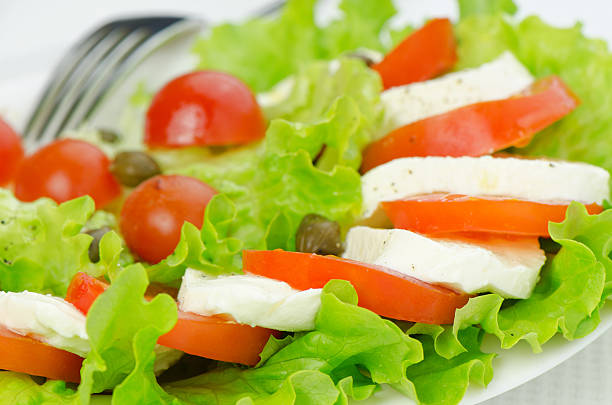 Salad with tomatoes and mozzarella stock photo