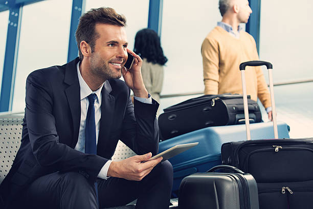 istock Man on phone at the airport 498833481