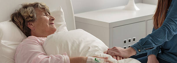 istock Daughter caring about ill mother 498838574