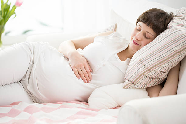 istock Stroking pregnancy belly 498839628