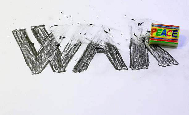 istock Eraser with written PEACE deletes the written WAR 498841546