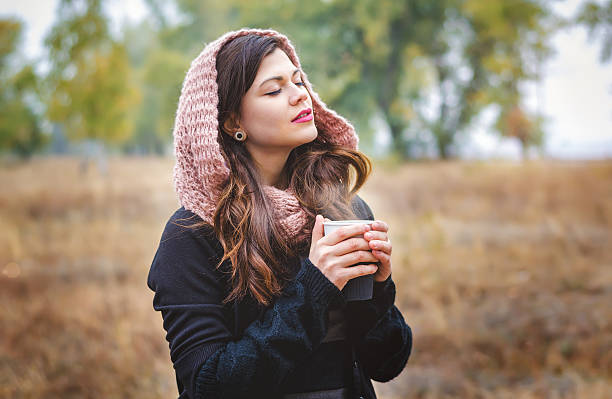 istock Young girl with a cup of coffee 498844200