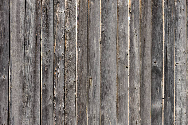istock gray aged wooden boards background 498845274
