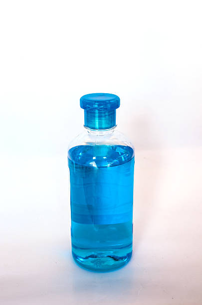 istock isopropyl alcohol bottle on isolated background 498846859