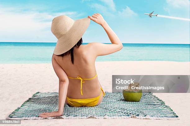 Woman In Bikini Enjoying Summertime Stock Photo - Download Image Now - Adult, Air Vehicle, Airplane