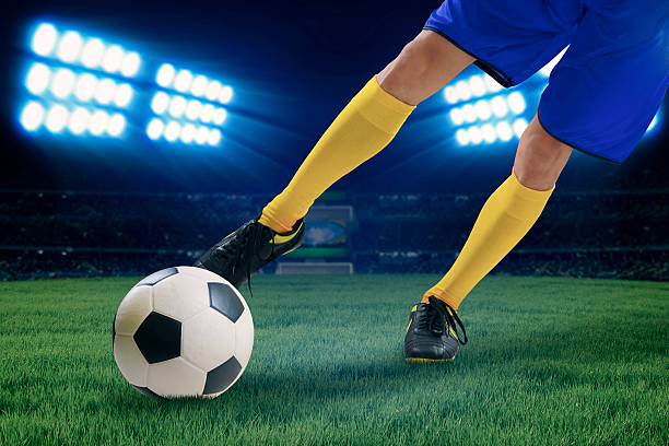 istock Soccer player kicking the ball 1 498848267