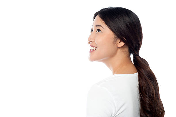 istock Smiling attractive girl looking at something 498848431