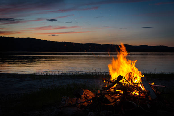 istock Summer Campfire and Lake at sunset 498849217