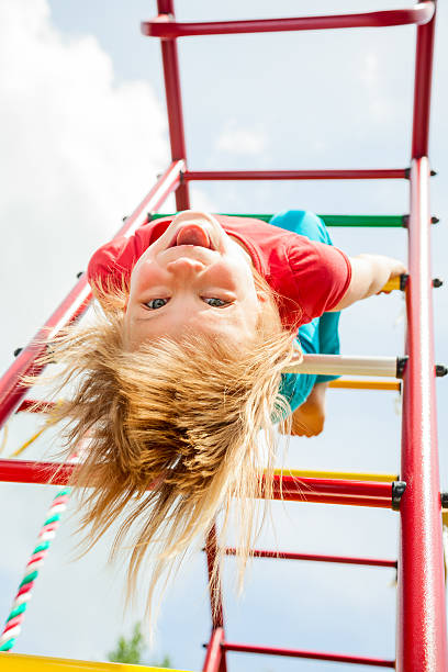istock Happy child on a jungle gym 498849705
