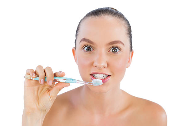 istock Funny woman with toothbrush 498852411
