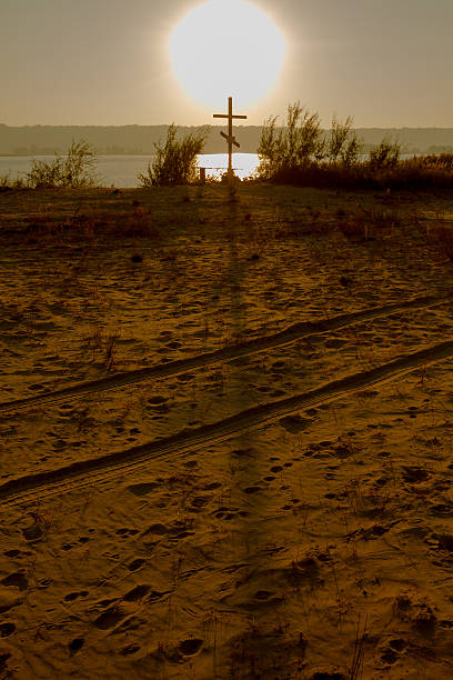 istock Cross near the water 498855116
