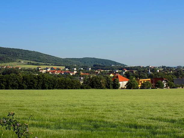 istock Field, village, forests and blue sky 498856692