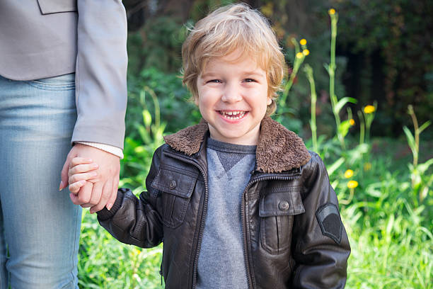 The small baby have a good time on a walks on the nature